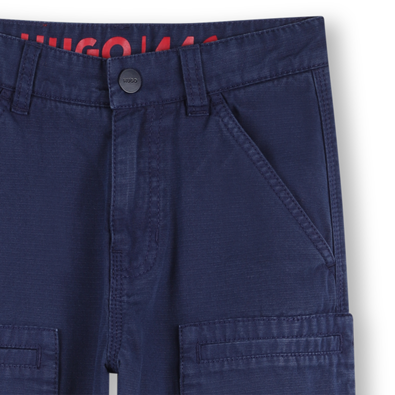 CAL&Ccedil;AS COM BOLSOS HUGO 
                        BOY