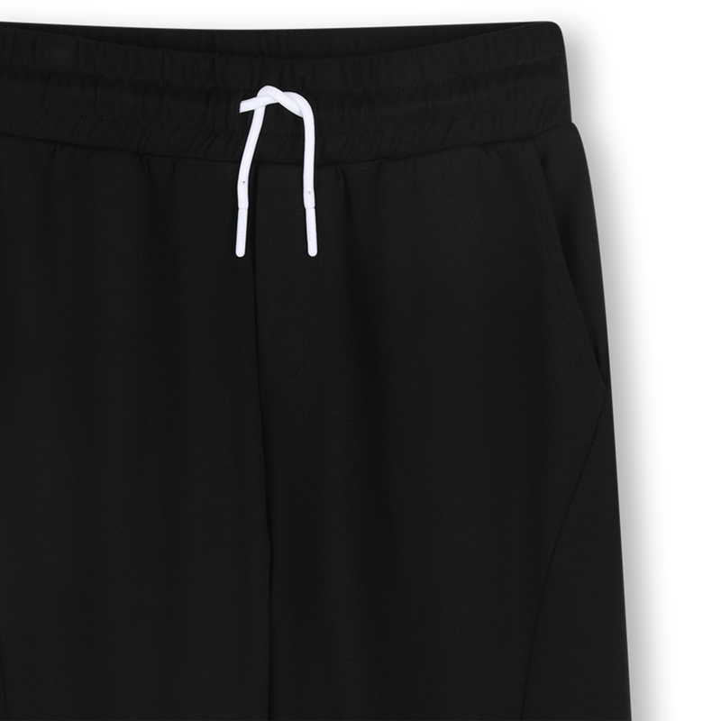 CAL&Ccedil;AS COM BOLSOS DKNY 
                        UNISEX