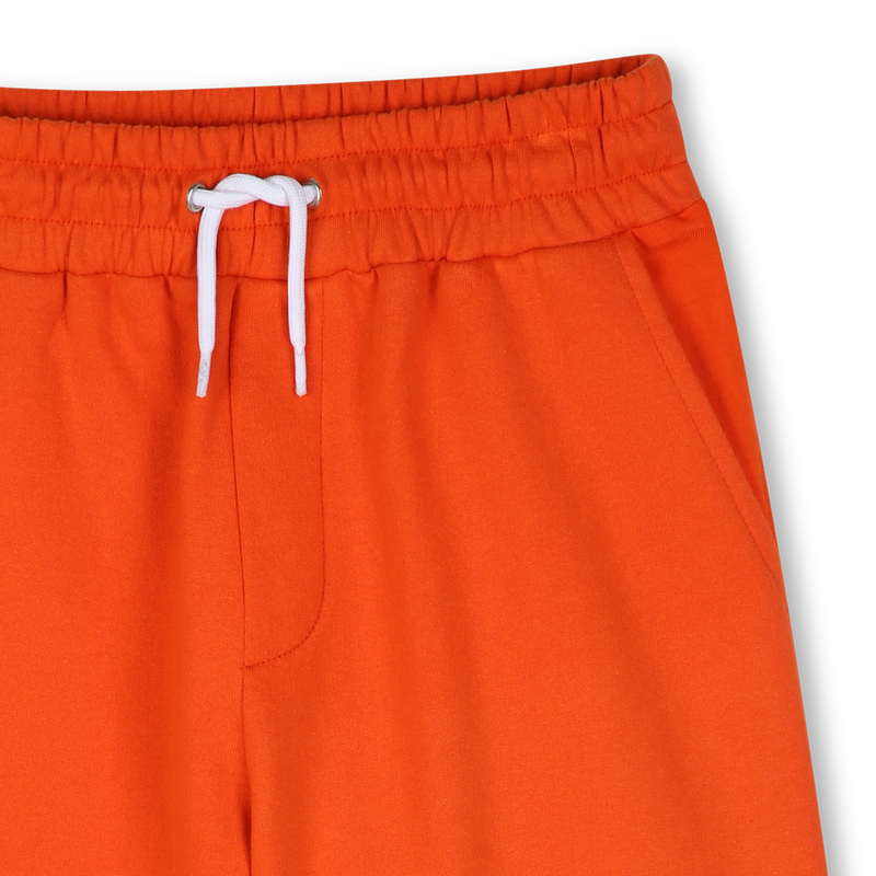 Conjunto de camiseta e bermuda DKNY 
                        MENINO