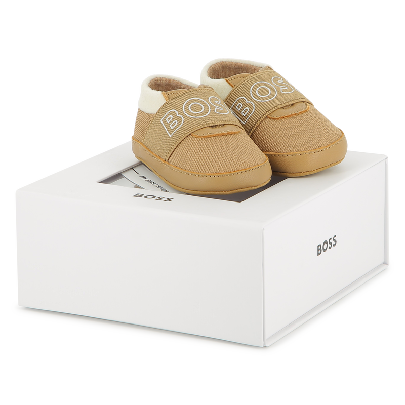 Chinelos de pele de carneiro macia BOSS 
                    UNISEX