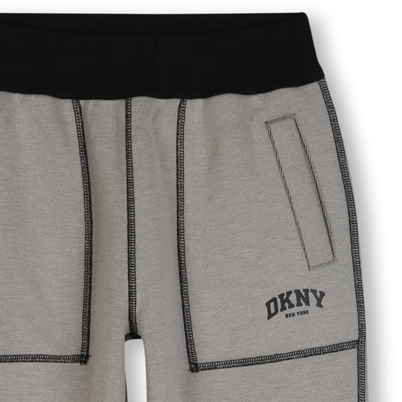 Cal&ccedil;as revers&iacute;veis DKNY 
                        BOY