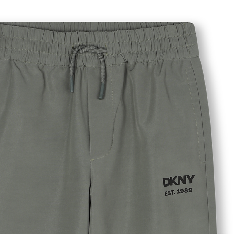 Calças repelentes de água DKNY 
                    BOY