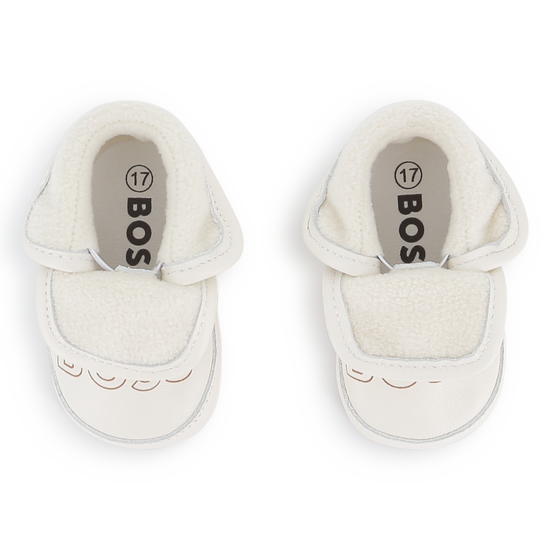 Chinelos de pele de carneiro macia BOSS 
                    UNISEX
