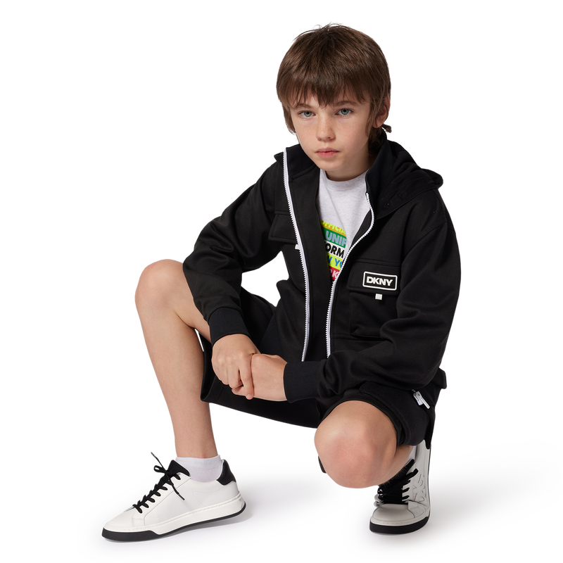 Sapatilhas em couro DKNY 
                    UNISEX