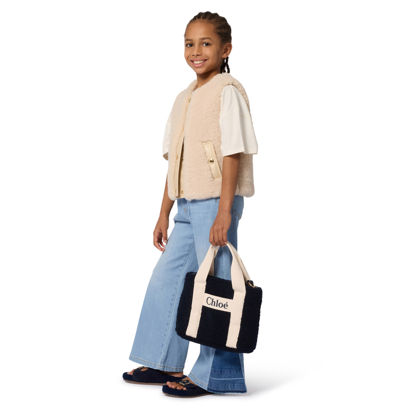 Sacola em lã de pele de carneiro CHLOE 
                        GIRL