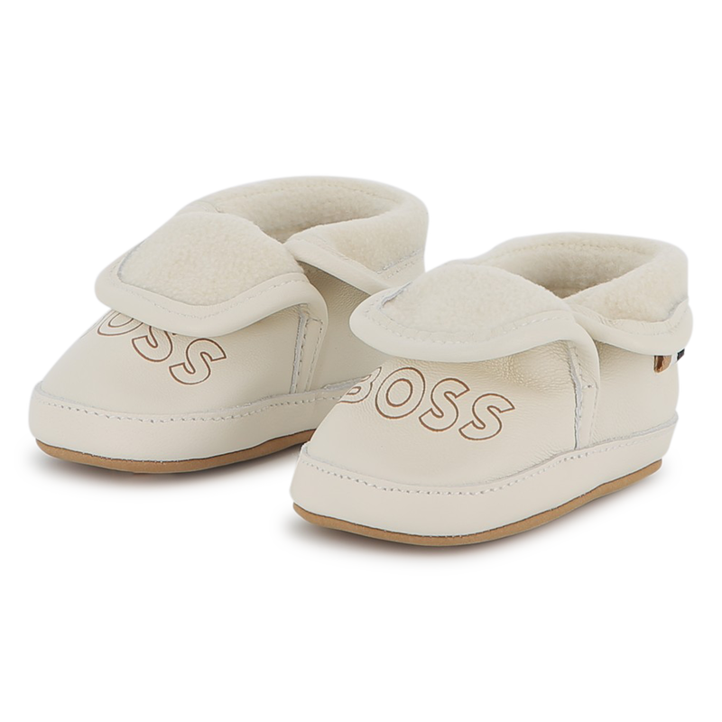 Chinelos de pele de carneiro macia BOSS 
                    UNISEX